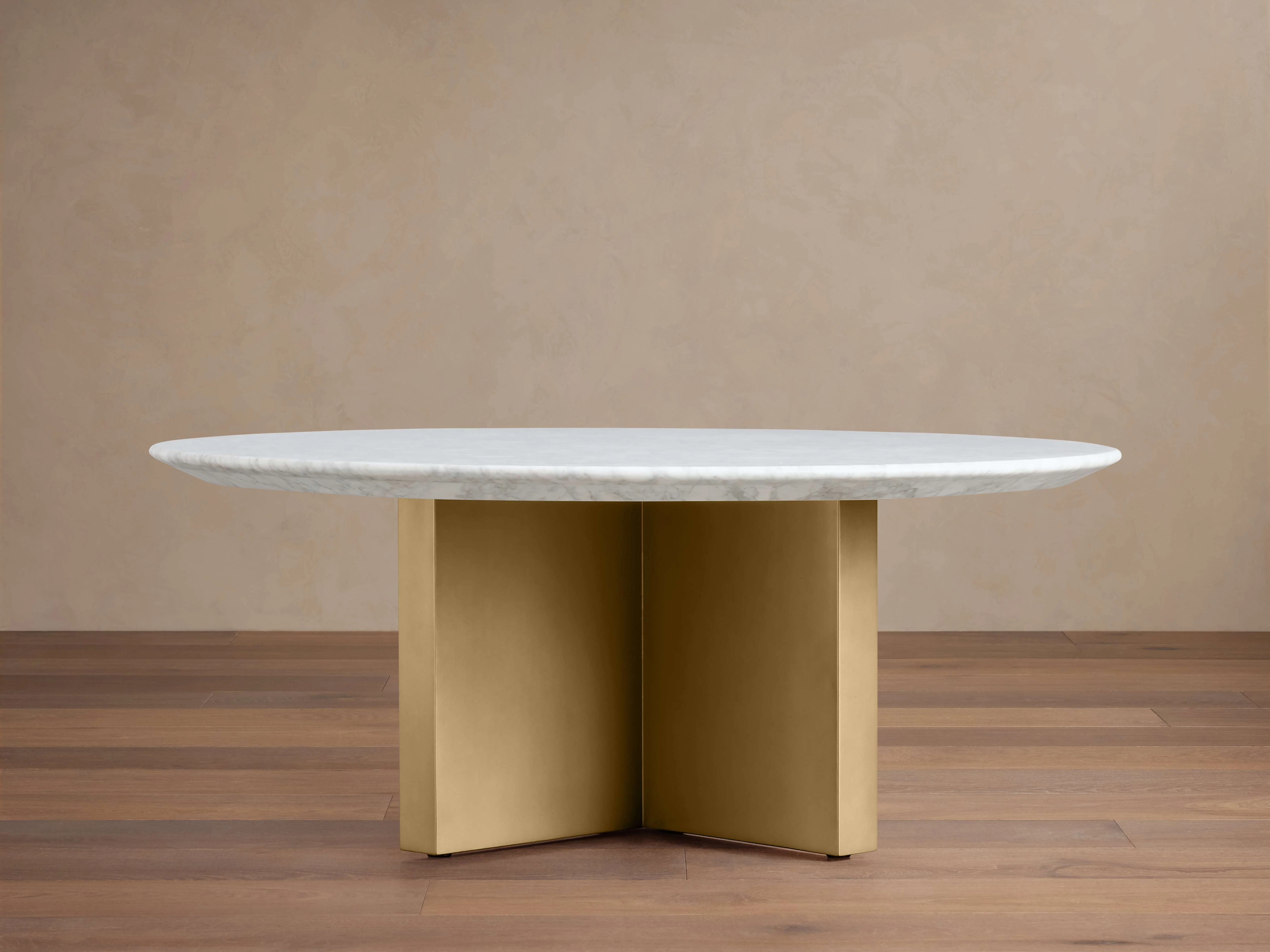 10898-saint-germain-round-stone-coffee-table-with-clement-base-1.webp