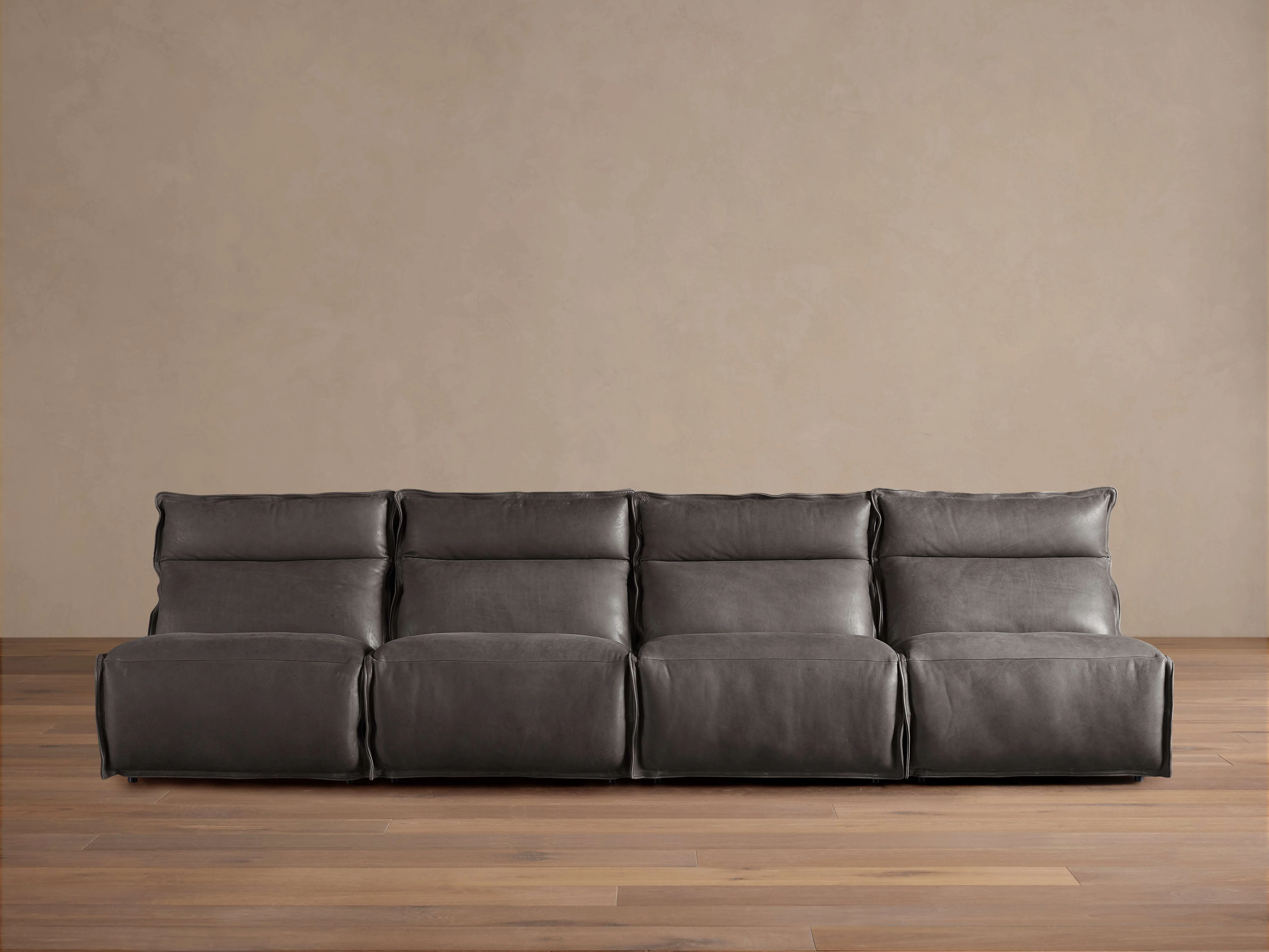 Rowland Leather Four-Piece Armless Motion Modular Sofa