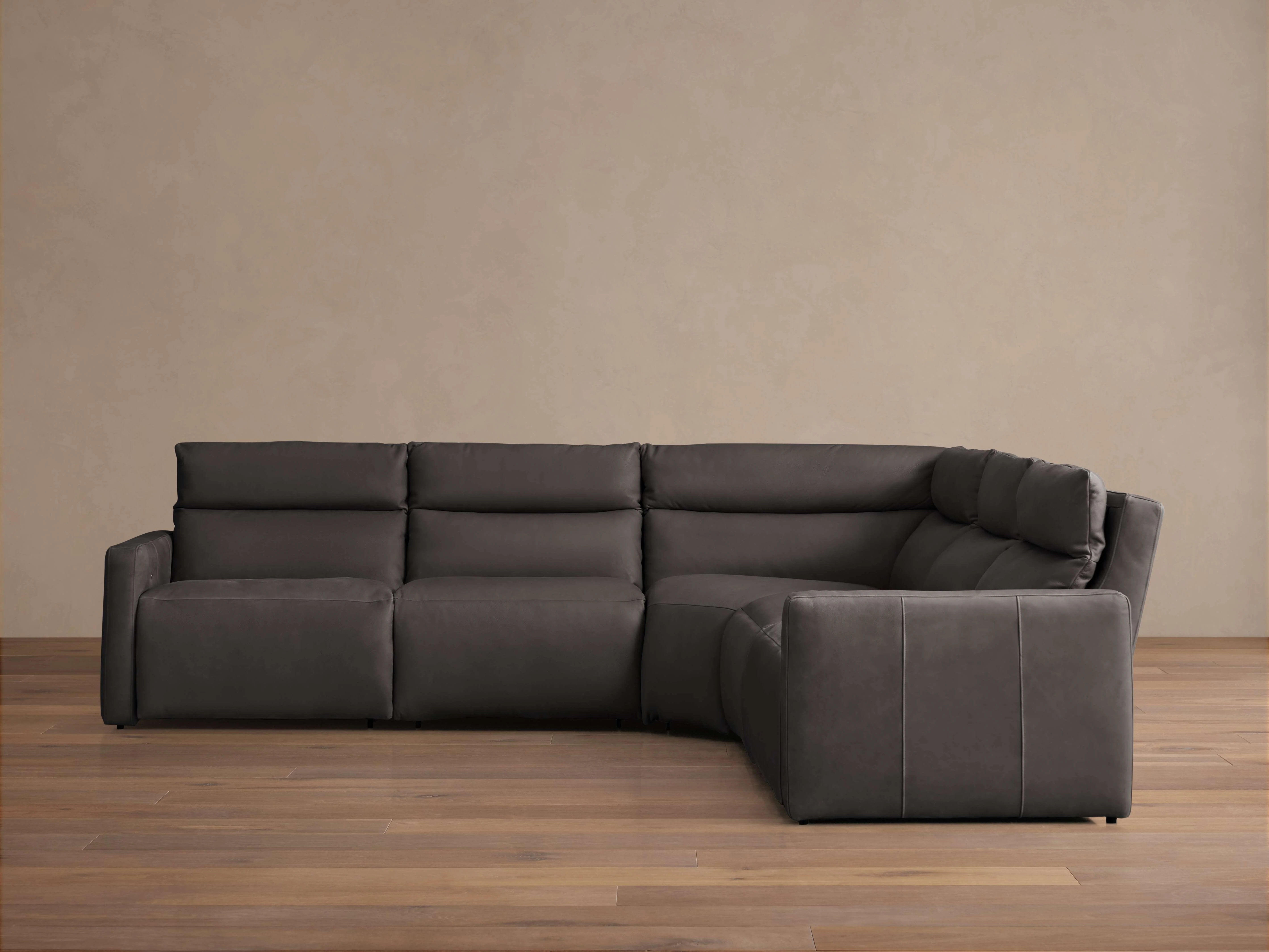 14879-rowland-tailored-leather-five-piece-motion-corner-sectional-1.webp