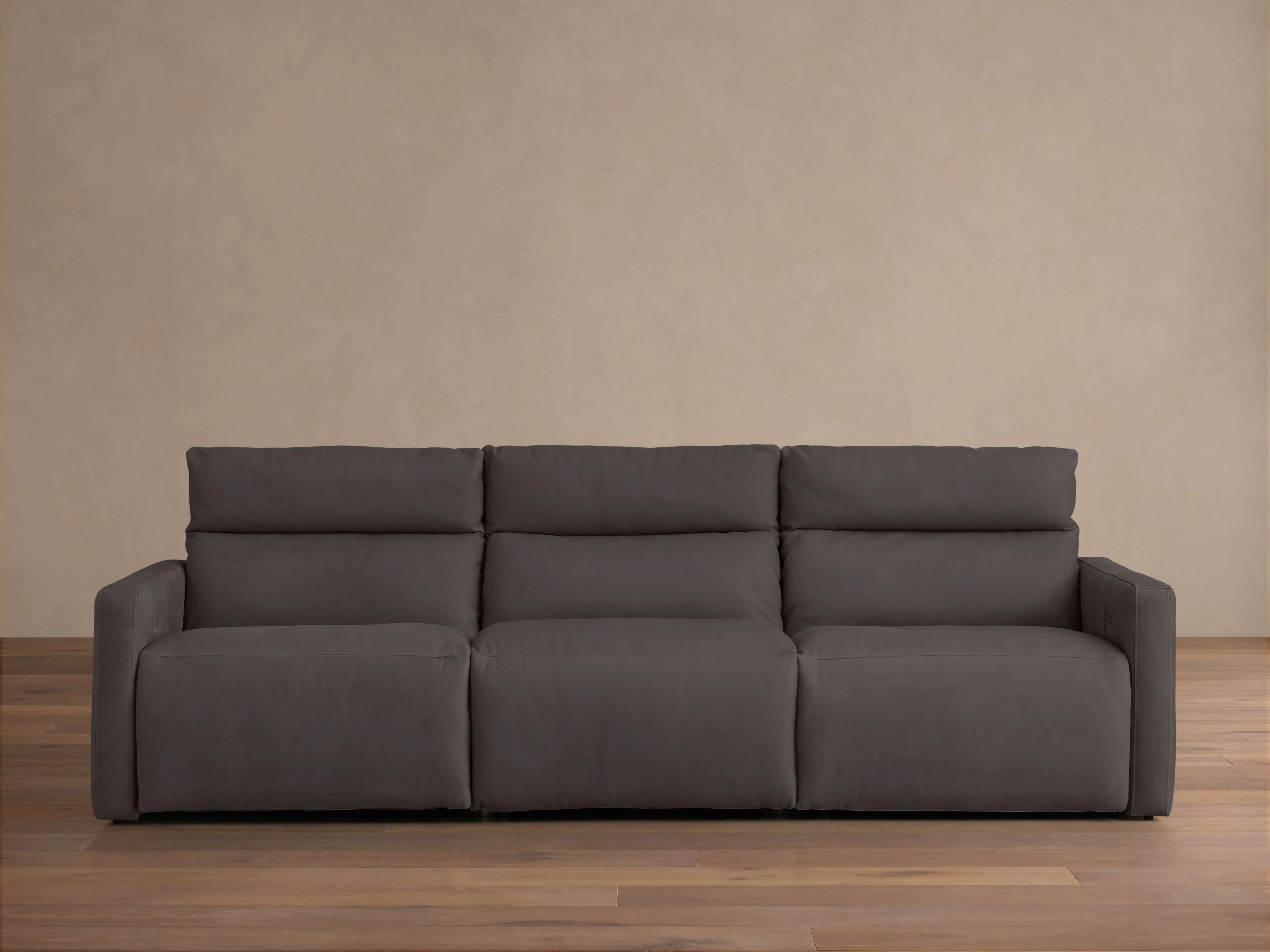 14904-rowland-tailored-leather-three-piece-motion-modular-sofa-1.webp