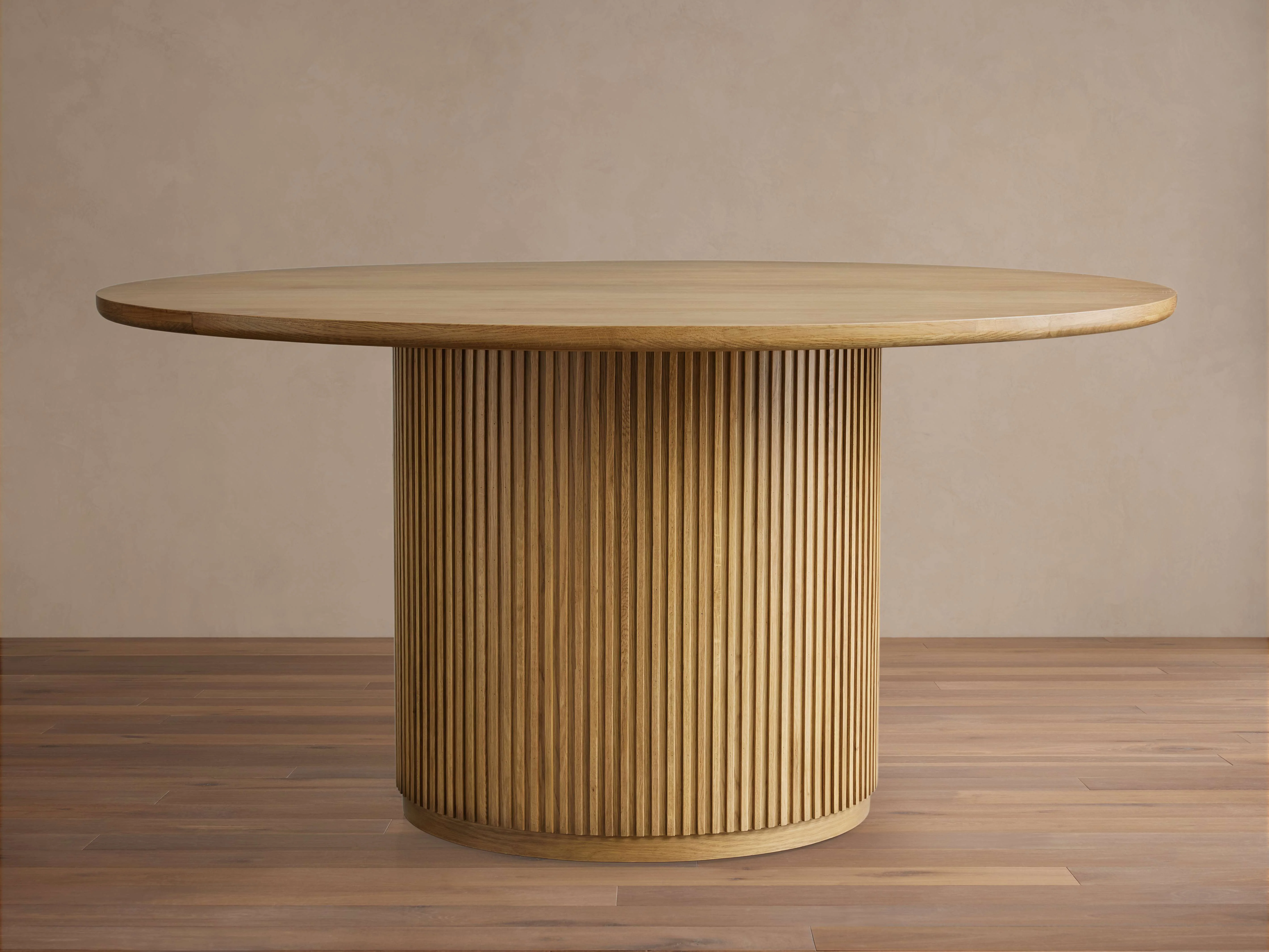 15778-finnley-round-wood-dining-table-1.webp