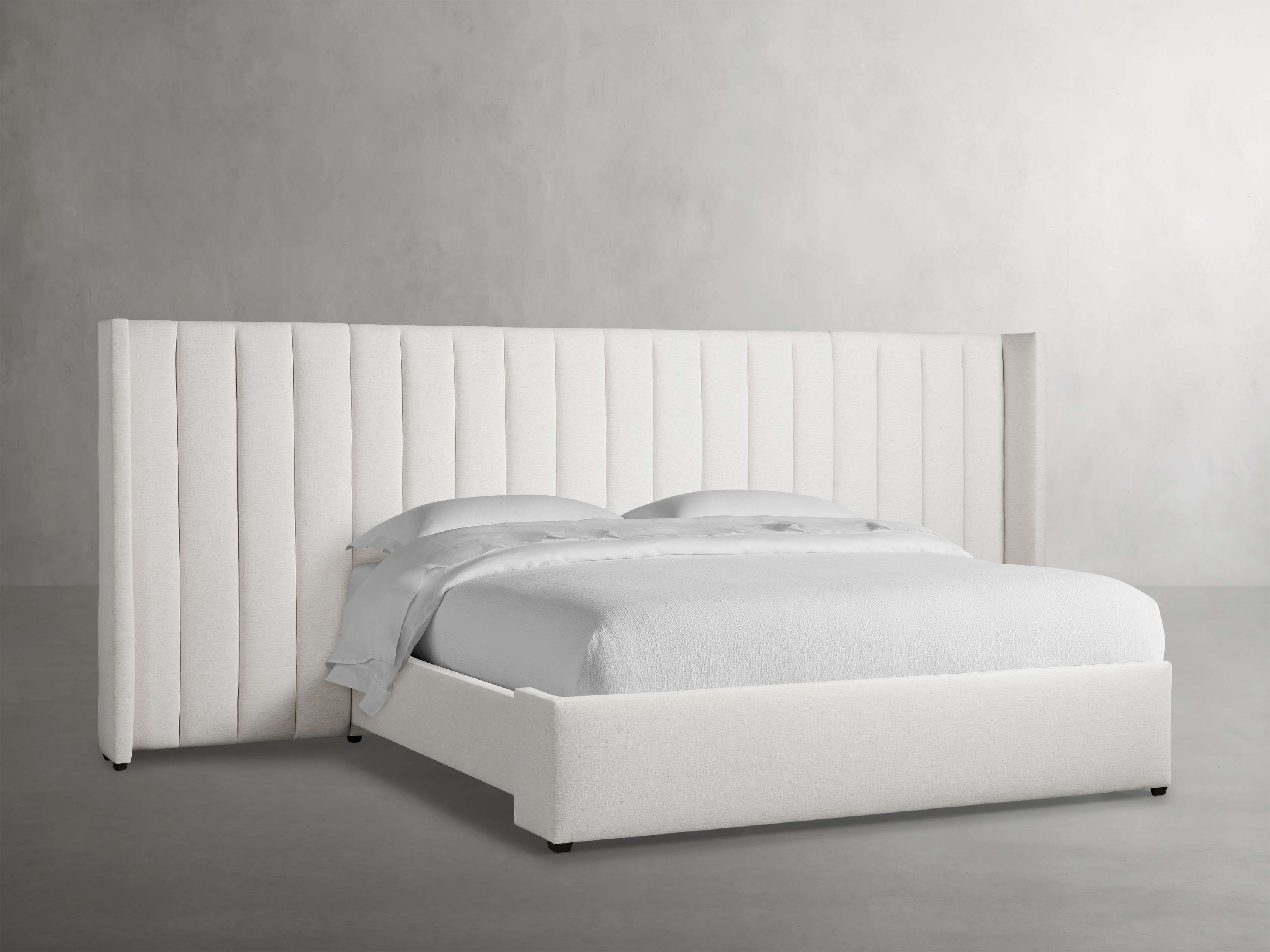 16103-wyller-channel-stitched-extended-headboard-bed-with-low-footboard-1.jpg