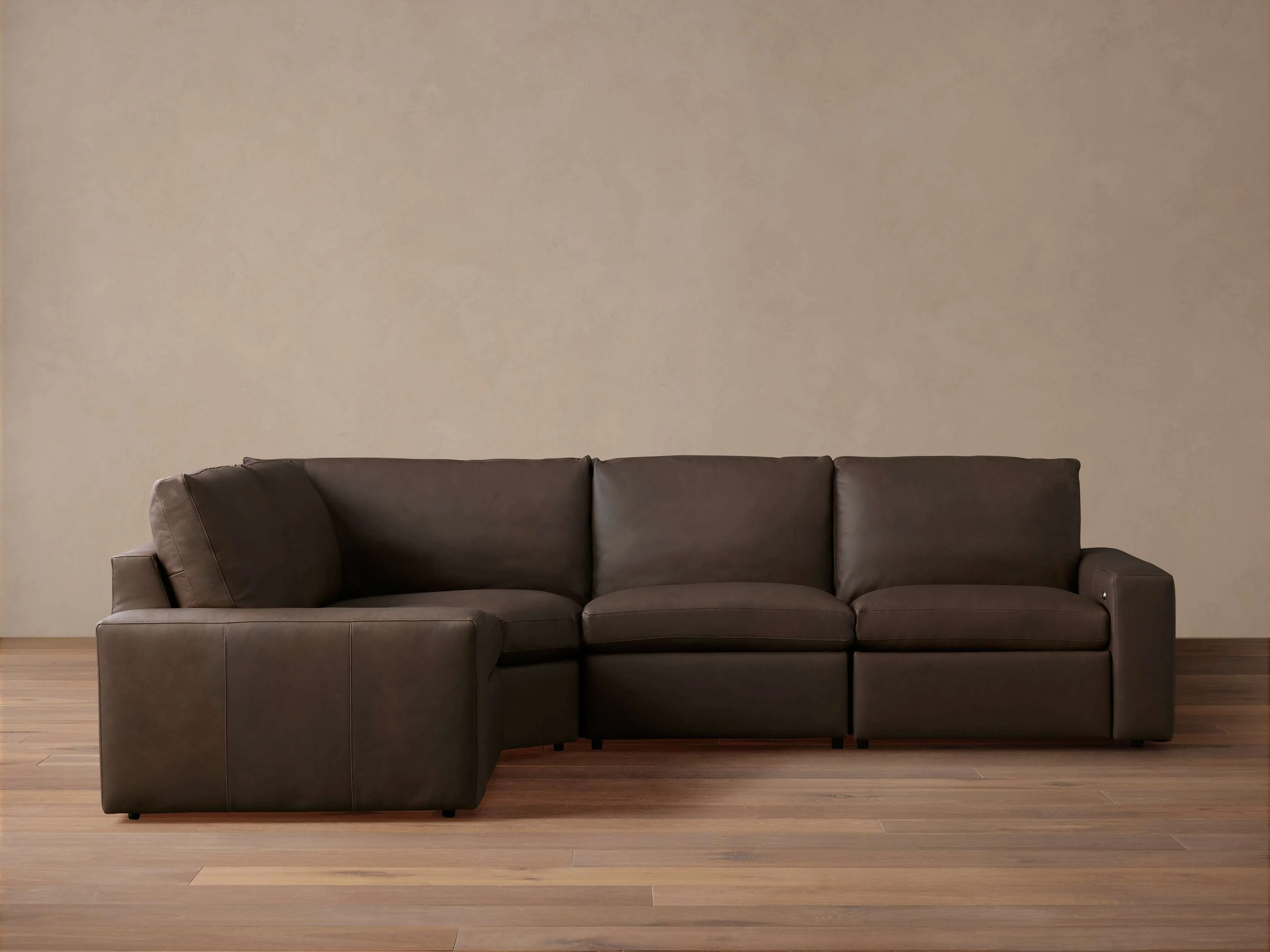 Kipton Wide Arm Leather Four-Piece Motion Sectional