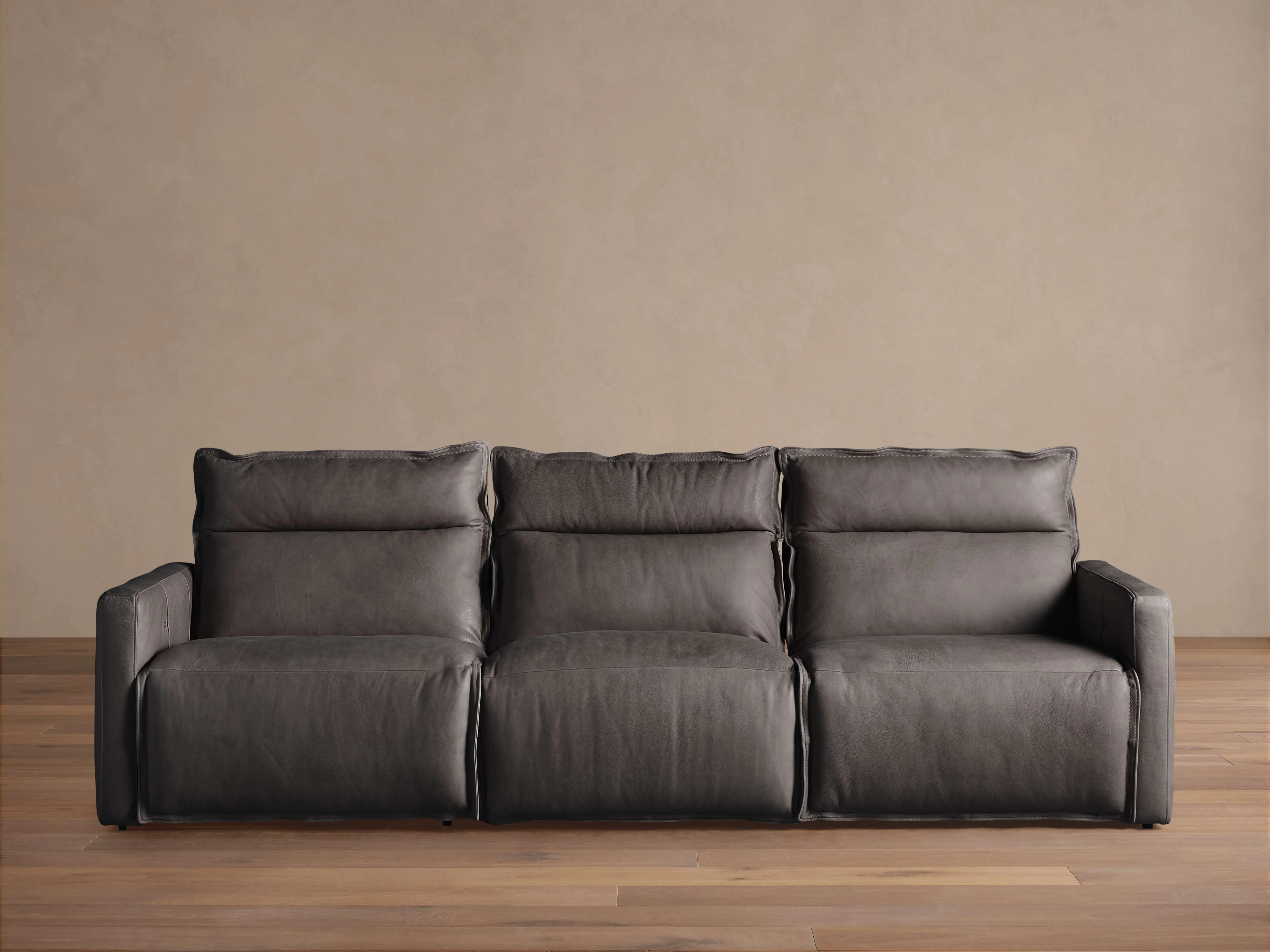 2532-rowland-leather-three-piece-motion-modular-sofa-1.webp